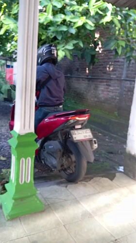 Evening domestic life documented in Baron, Indonesia household