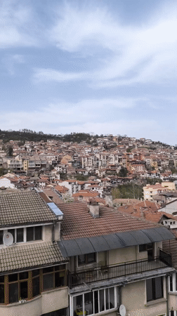 Tourist documents afternoon wandering through historic Veliko Tarnovo