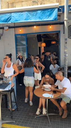 Festive outdoor market and street scene in Tel Aviv