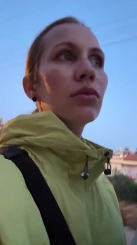 Woman films selfie video while riding moped in Fethiye