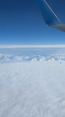 Aerial view captured from airplane window over Gazi-Yurt, Russia