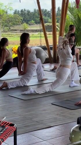 Morning yoga sessions documented at bamboo wellness retreat in Ubud