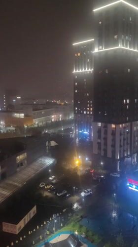 Child plays with exercise equipment during stormy evening in Mytishchi