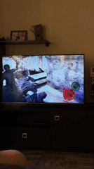 Gaming session with vintage boombox observed in Merdzavan home