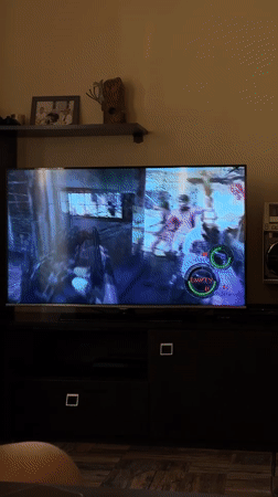 Gaming session with vintage boombox observed in Merdzavan home
