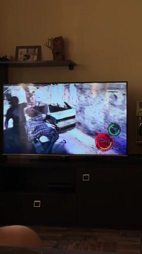 Gaming session with vintage boombox observed in Merdzavan home