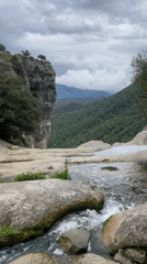 Visitors capture scenic mountain stream views in Rupit i Pruit