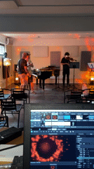Musical trio rehearses in Tivat venue with recording setup