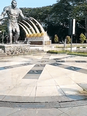 Bronze primitive human statue documented in Sragen Kulon plaza