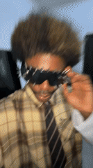 Man in spiked sunglasses photographed in Igboefon, Nigeria
