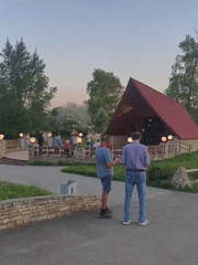 Outdoor event and lakeside gathering documented in Варзи-Ятчи, Russia