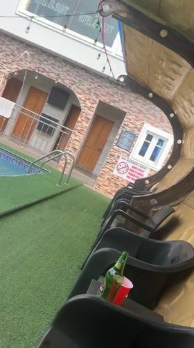 Hotel pool area documented in Asaba Nigeria daytime footage
