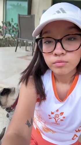Woman documents afternoon with dogs in Acapulco home setting