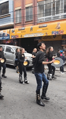 Street dancers perform coordinated procession in La Paz Bolivia