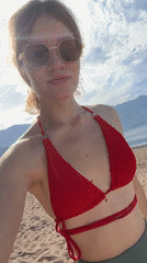 Woman enjoys early morning beach time in Boreti, Montenegro