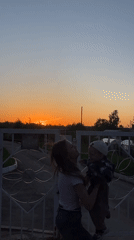 Family enjoys sunset playtime in Фоки, Russia