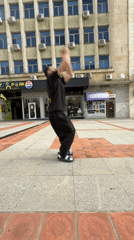 Street performer executes backflip in Bulgarian city square