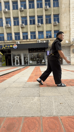 Street performer executes backflip in Bulgarian city square