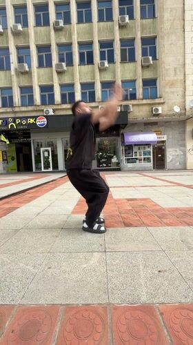Street performer executes backflip in Bulgarian city square