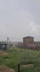 Rainy day art session captured in rural Russian village