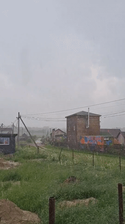 Rainy day art session captured in rural Russian village