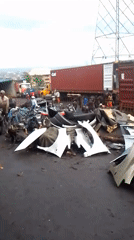 Auto salvage workers repair engines in Onitsha yard