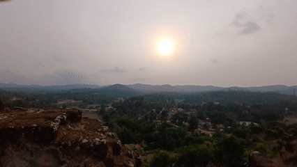 Visitor explores ancient Nagara Fort ruins in India