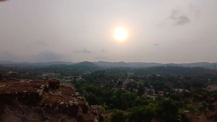 Visitor explores ancient Nagara Fort ruins in India