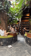 Tree-integrated restaurant documented in pre-dawn hours, Mengwi Indonesia