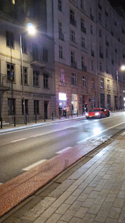 Night walk through central Warsaw, red Lamborghini included