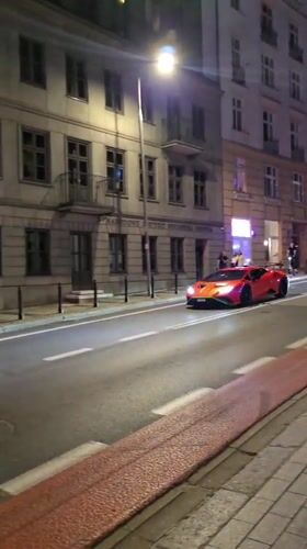 Night walk through central Warsaw, red Lamborghini included
