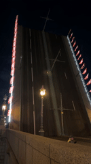 Palace Bridge raised at night in Saint Petersburg