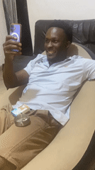 Man relaxes at home in Kubwa, Nigeria