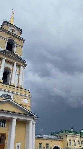 Perm city center: church tower, mansard rooftops, and a public square