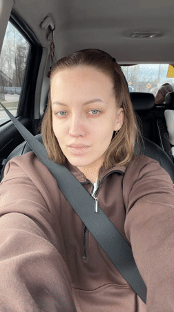Couple takes selfies in car in Klin, Russia
