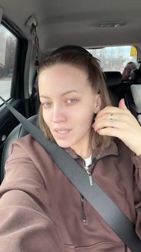 Couple takes selfies in car in Klin, Russia