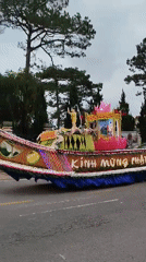 Ornate Buddhist float parades through Đà Lạt streets