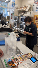 Morning convenience store activity captured in Osaka