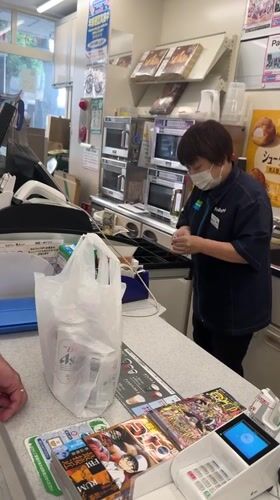 Morning convenience store activity captured in Osaka