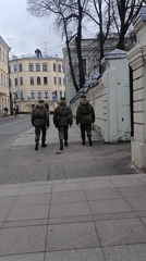 Moscow sidewalks capture military, wedding, maintenance scenes Saturday morning