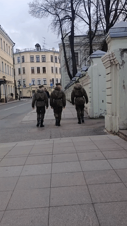 Moscow sidewalks capture military, wedding, maintenance scenes Saturday morning