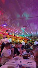 Restaurant boat diners enjoy evening meal in Beyoğlu