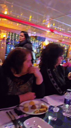 Restaurant boat diners enjoy evening meal in Beyoğlu