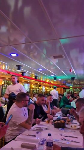 Restaurant boat diners enjoy evening meal in Beyoğlu