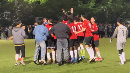 Nighttime soccer match documented by witnesses in Shanghai