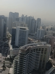 Morning aerial documentation of Dubai cityscape and breakfast