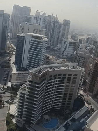 Morning aerial documentation of Dubai cityscape and breakfast