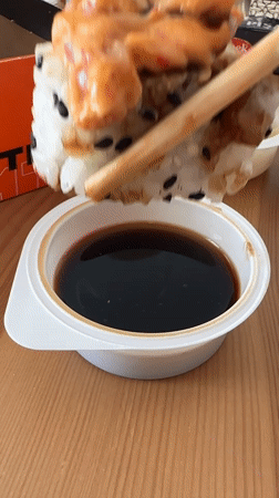 Man enjoys sushi meal in Vsevolozhsk apartment