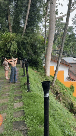 Two women visit scenic overlook in Ubud valley