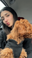 Woman with poodle caught in heavy rainfall in Montenegro